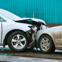 car collision accident on street. Two cars crashed in front